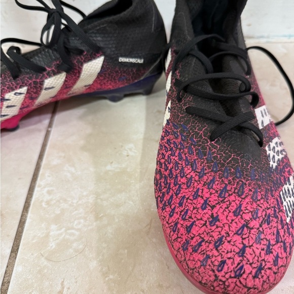 Pink and Black Soccer Cleats